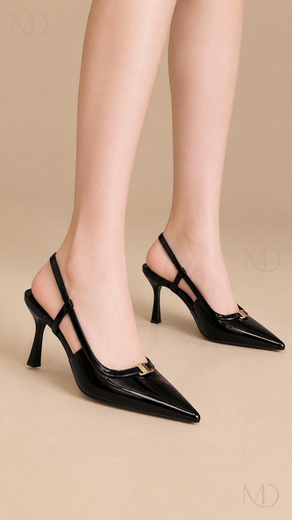 Nadia black pointed slingback heels worn close-up on feet and lower legs