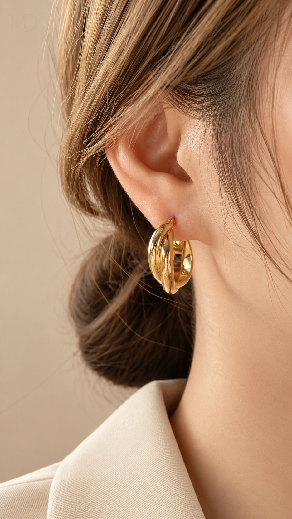 Torsade Twisted Hoop Earrings - Gold worn model close-up
