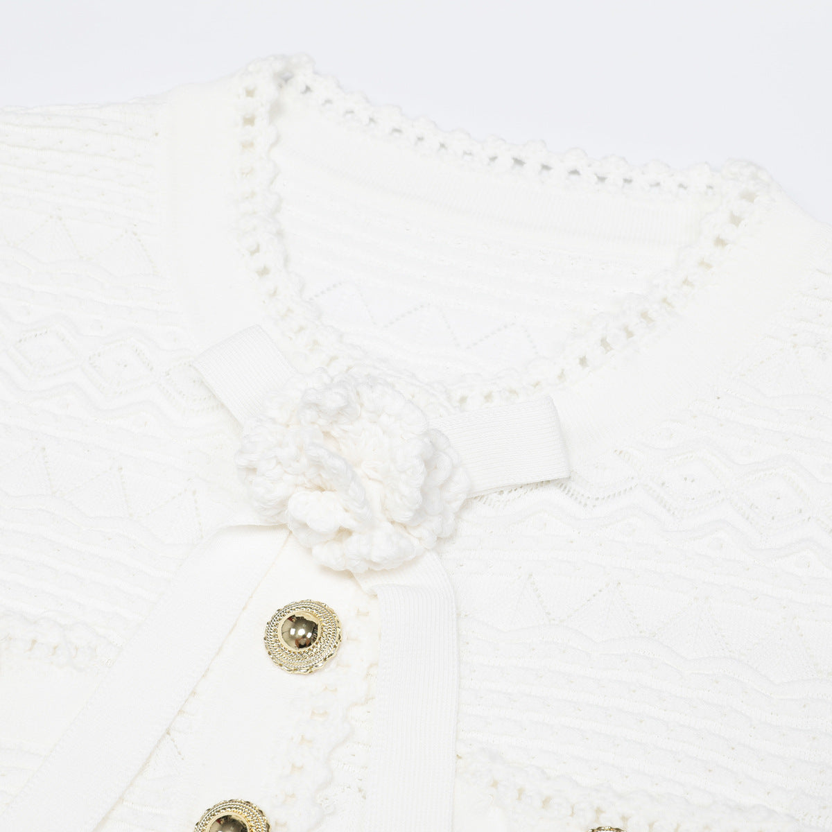 Coralie Pearl-Button Knit Peplum Top