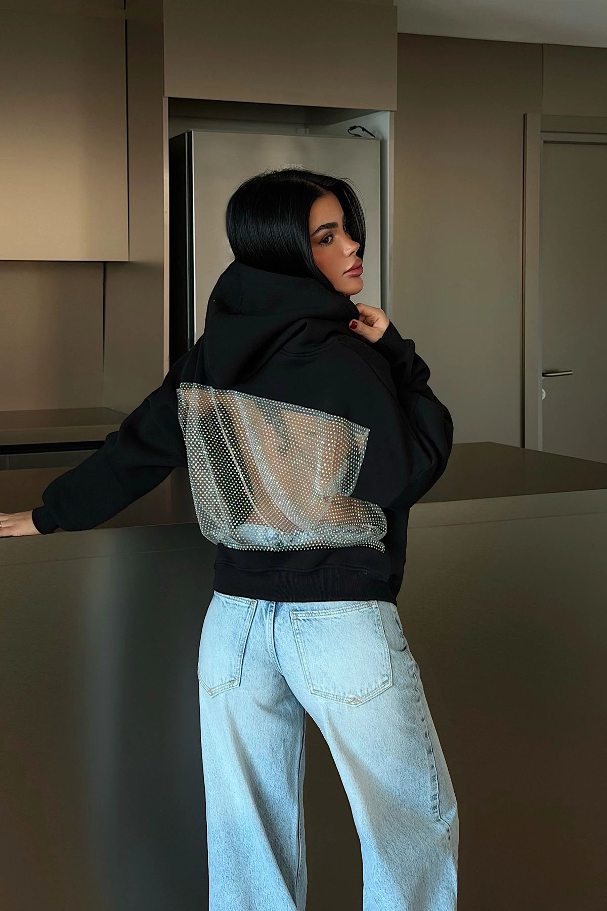 Black Hooded Sweatshirt with Stone Detail on the Back