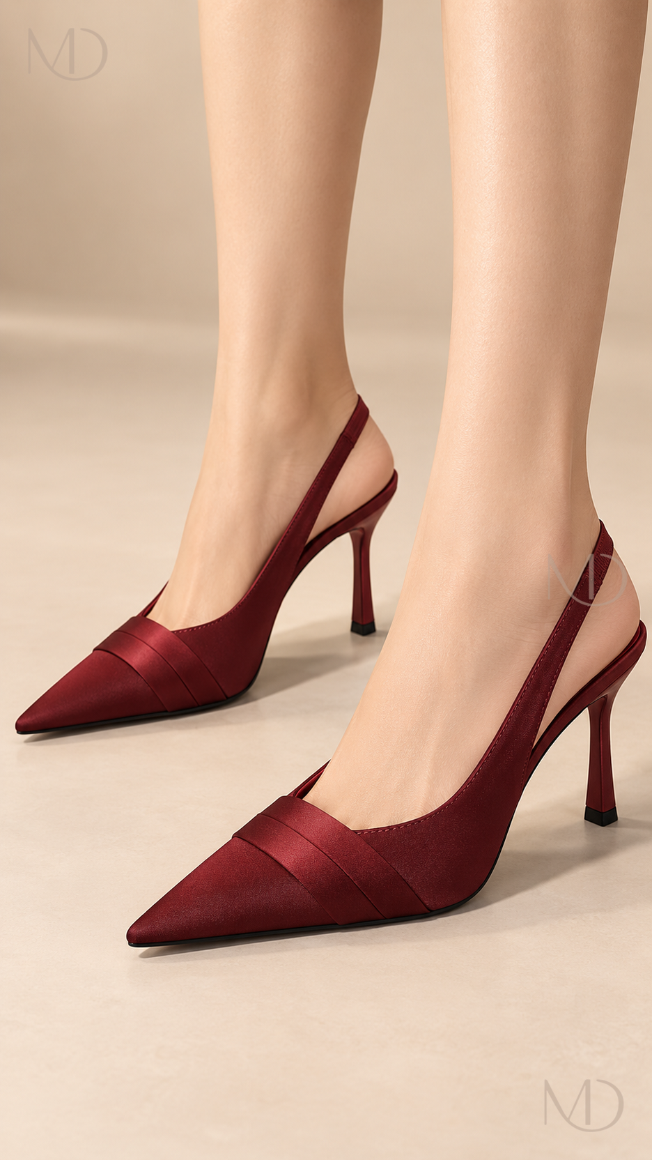Aria wine-red satin slingback heels worn close-up on feet and lower legs