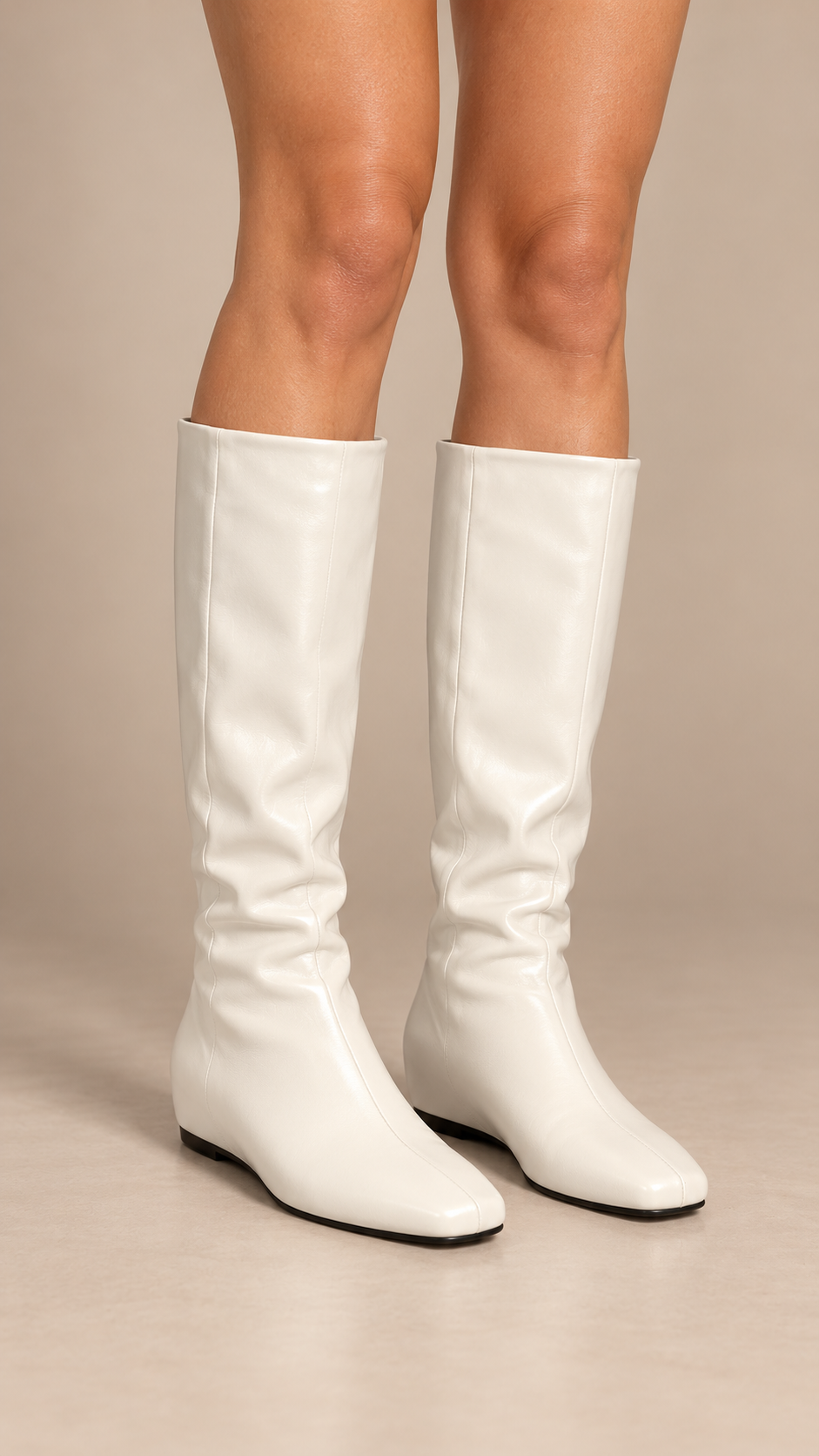 Margery Slouch Knee Boot — Cream White worn closeup