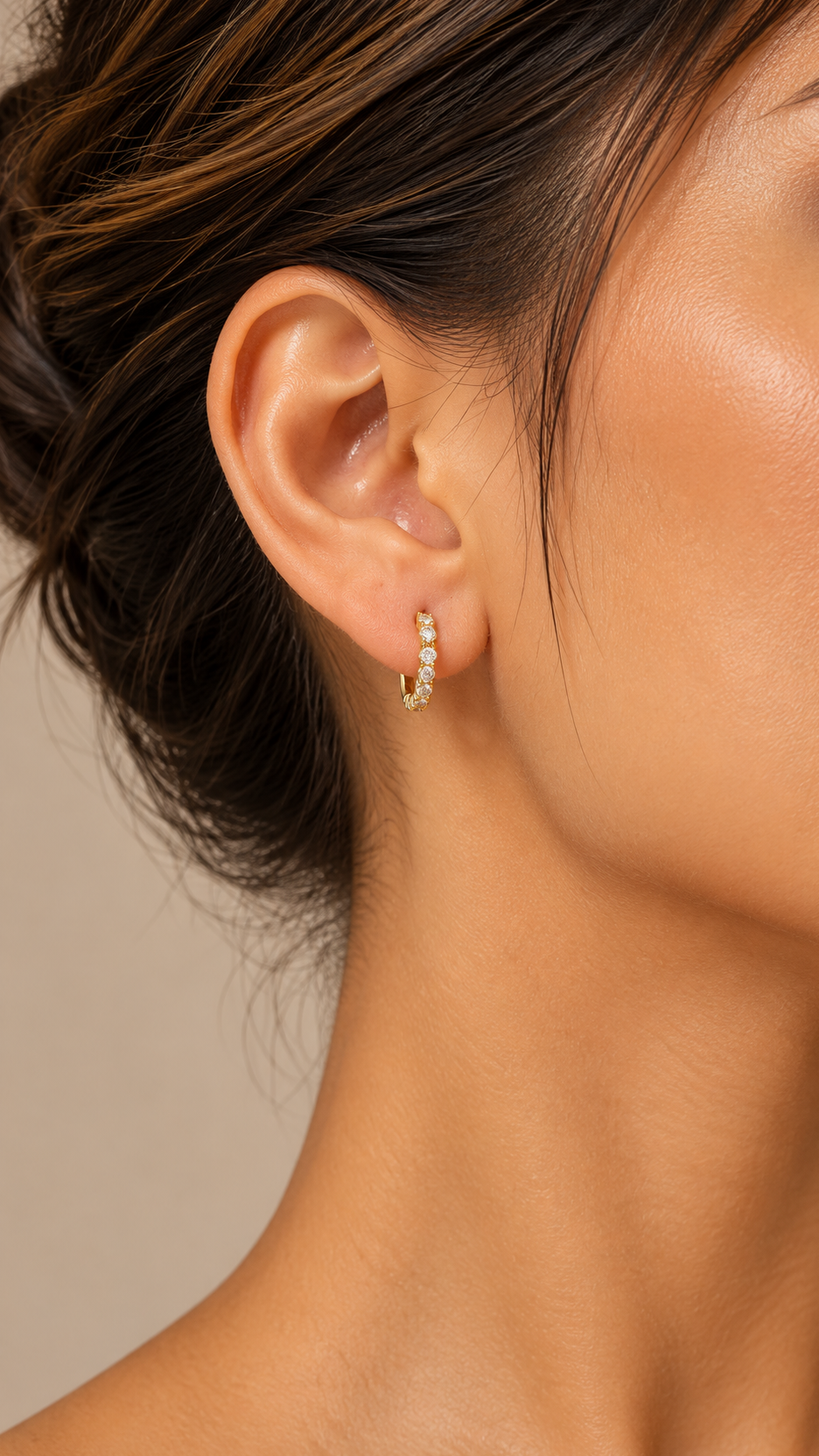 Camilla Pave Huggie Hoops — Gold worn closeup