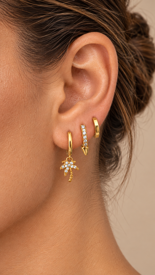 Zelie Huggie Hoop Set — Gold worn closeup