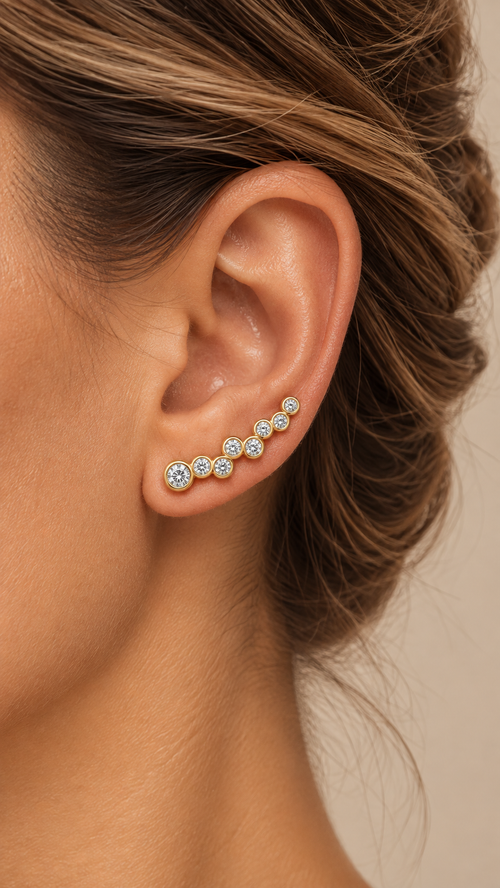 Ismene Bubble Ear Climber — Gold worn closeup