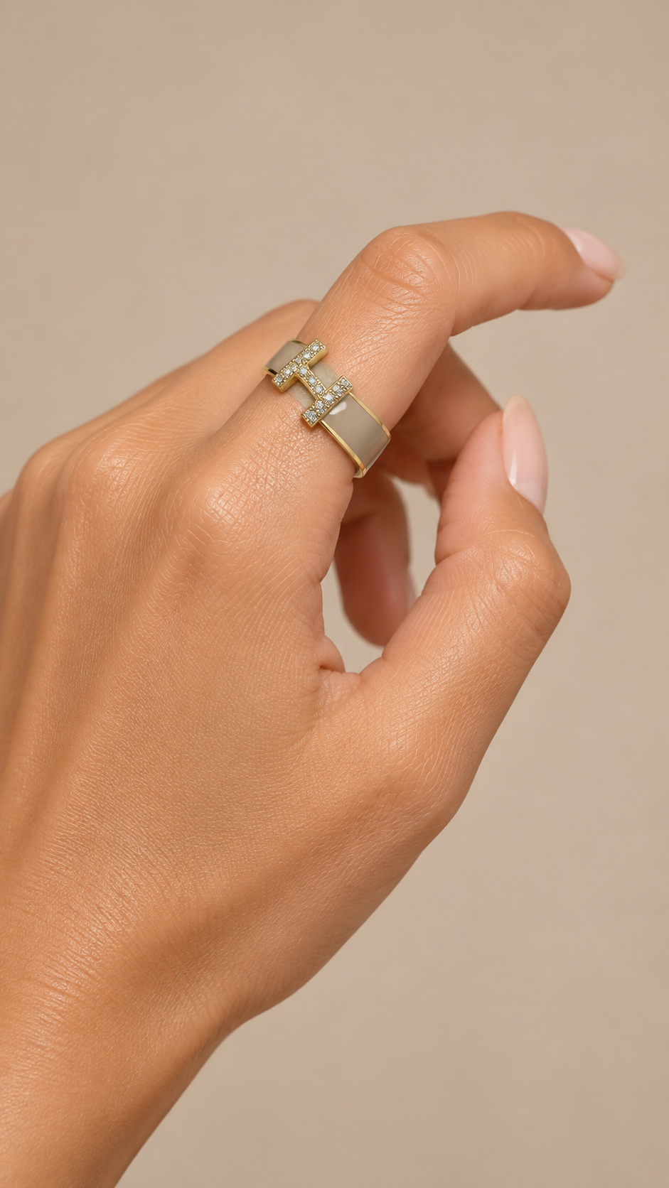 Hazel Enamel H Ring — khaki worn closeup