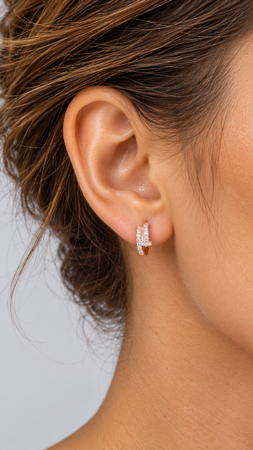 Thessaly Nail-Wrap Earrings — Rose gold worn closeup