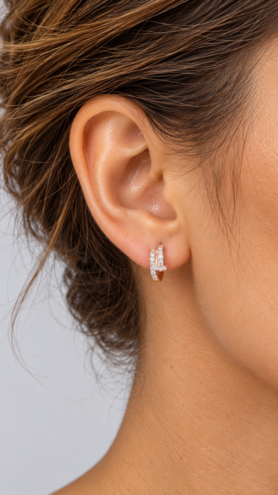 Thessaly Nail-Wrap Earrings — Rose gold worn closeup