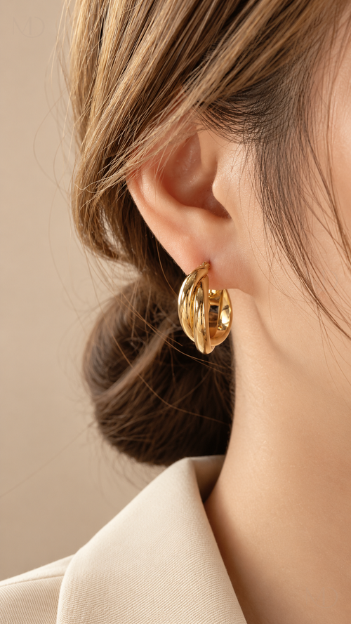 Torsade Twisted Hoop Earrings - Gold worn model close-up